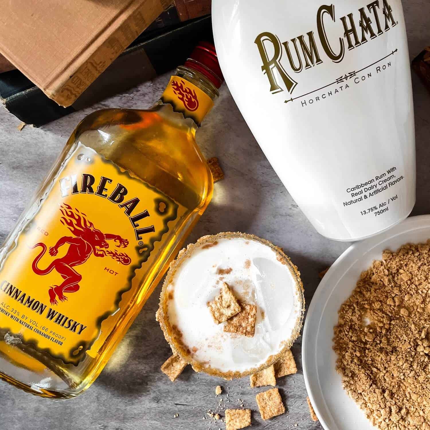 Cinnamon Toast Crunch Shot next to Fireball and RumChata.