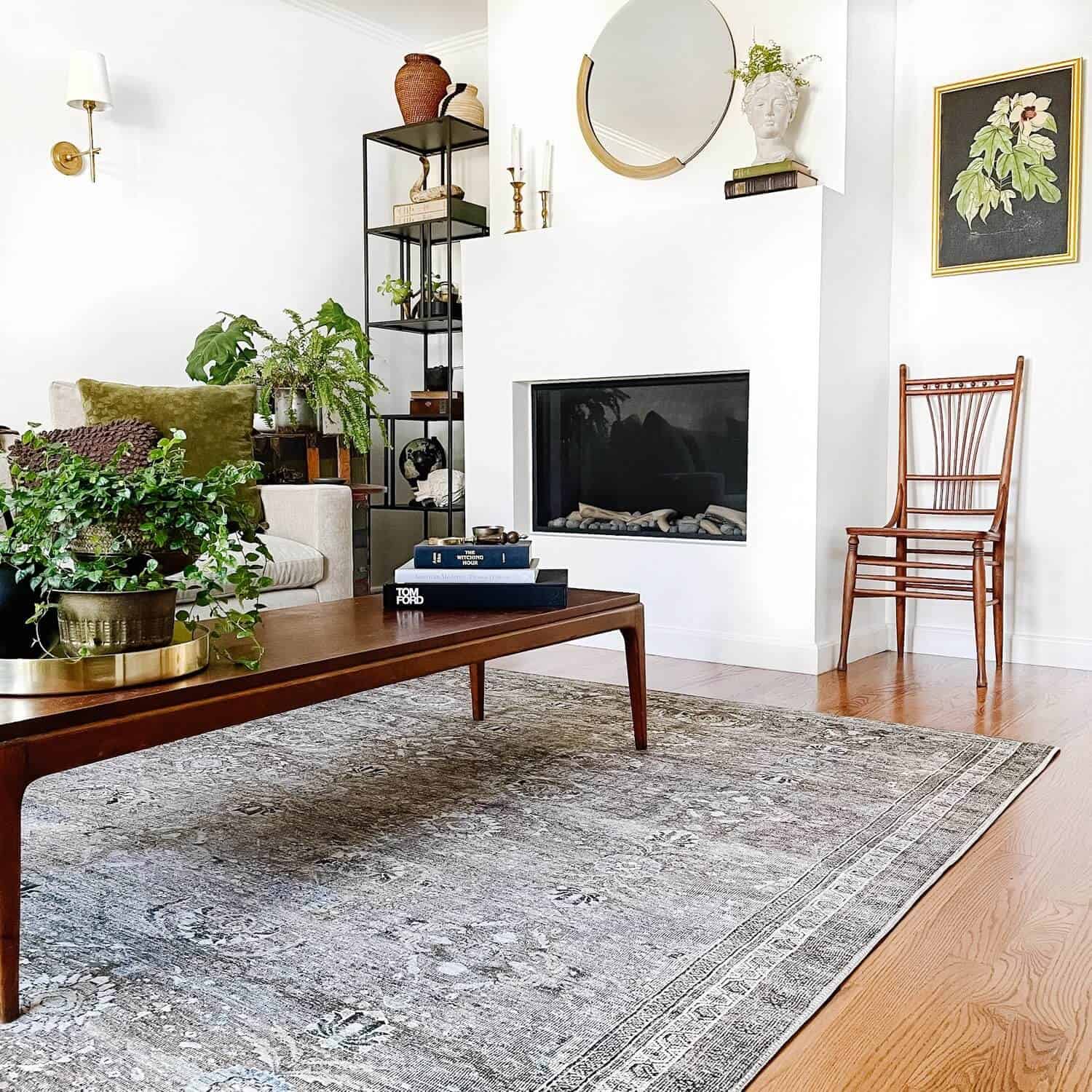 Coffee table on a large area rug.