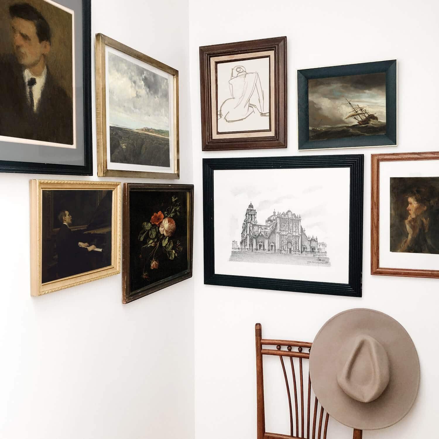 Gallery walls on two white walls.