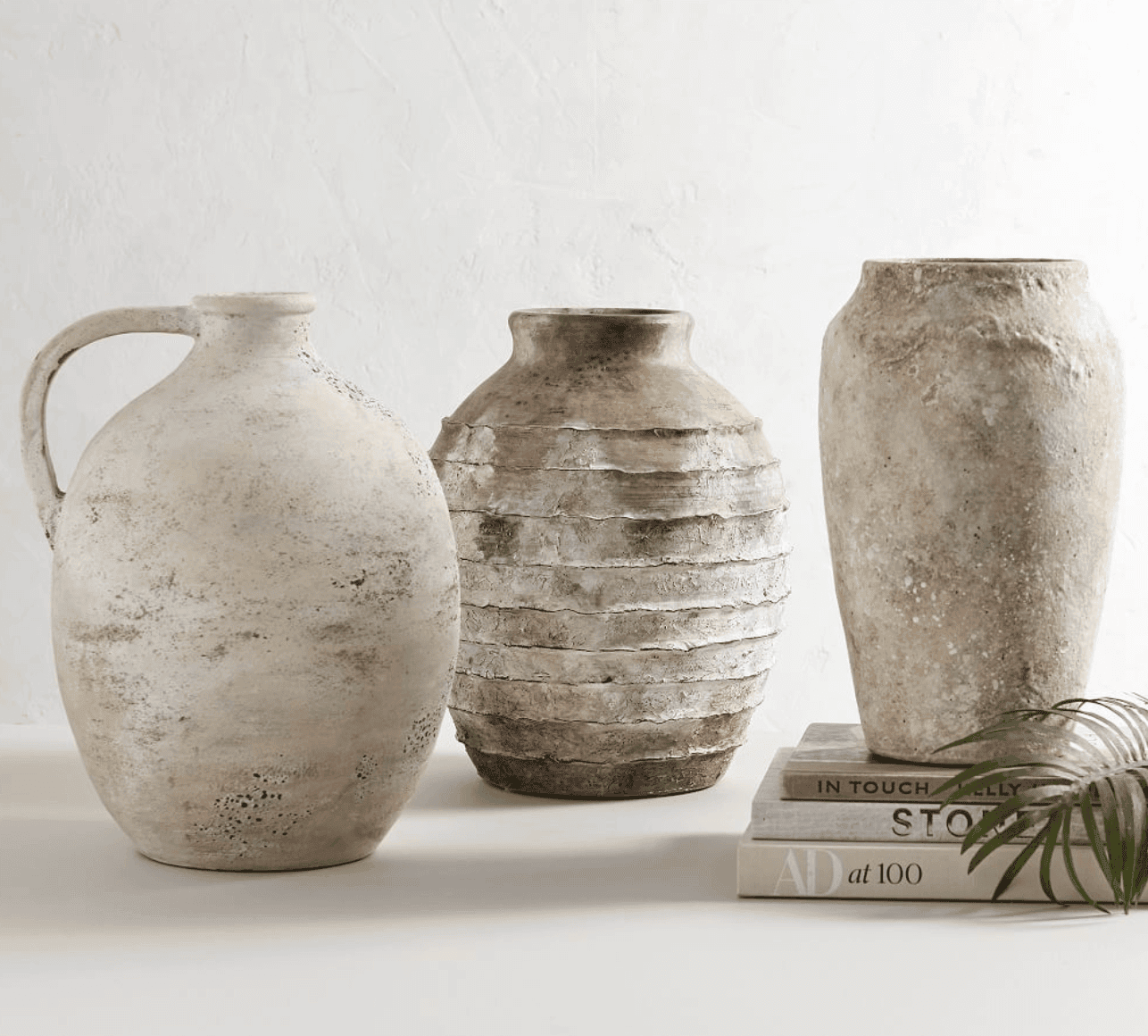 Set of three Distressed Vessels.