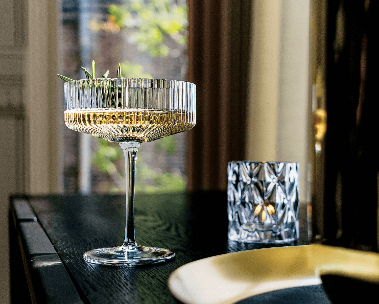 Drink in a long-stemmed cocktail glass.