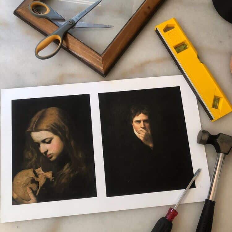Framing tools around prints of people.