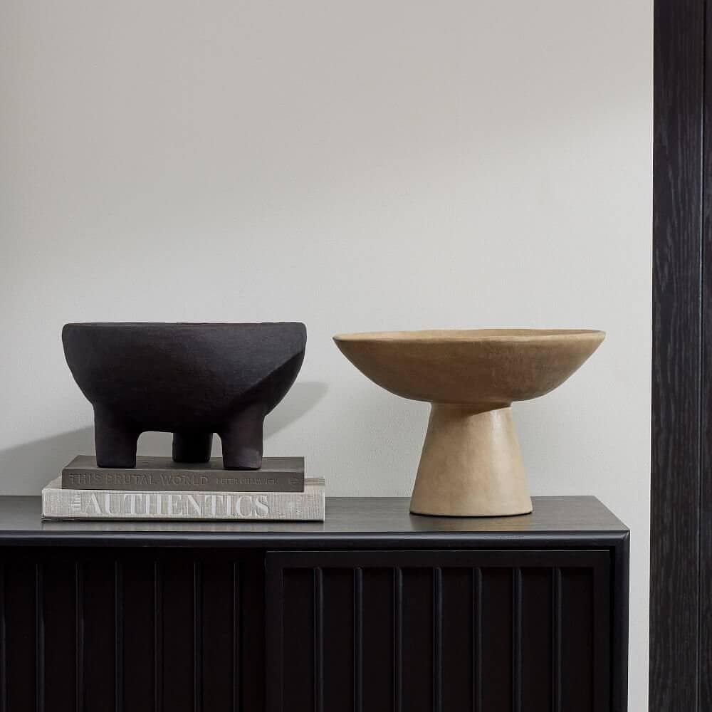 Two vases with large bowls.
