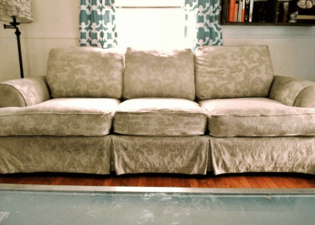 Worn and wrinkled sofa.
