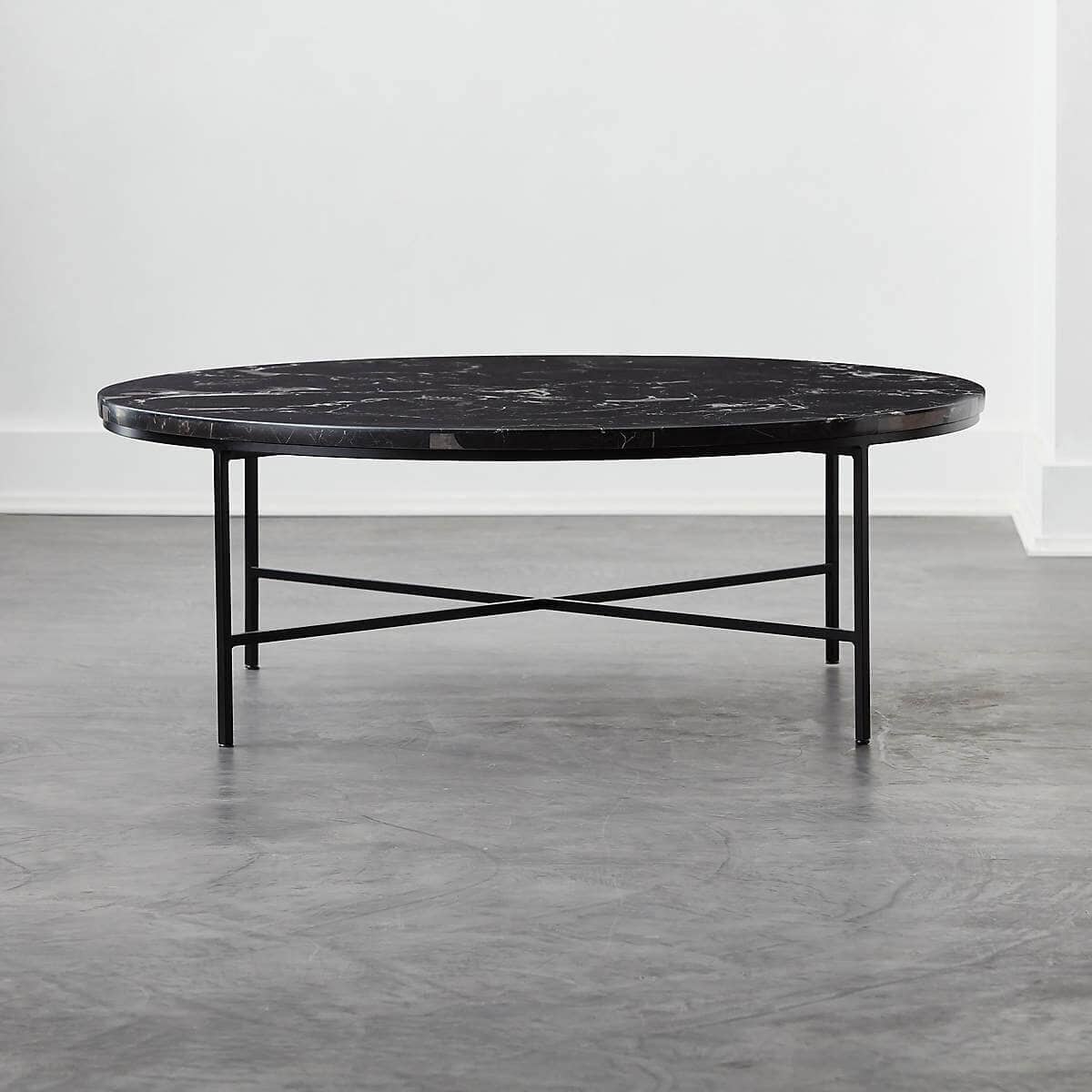 Round black marble coffee table.