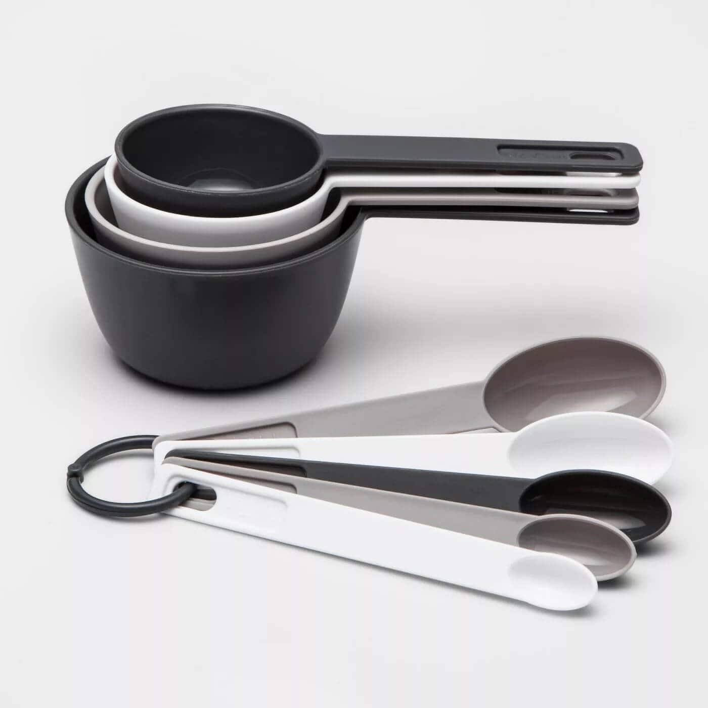 Four measuring cups and five measuring spoons.