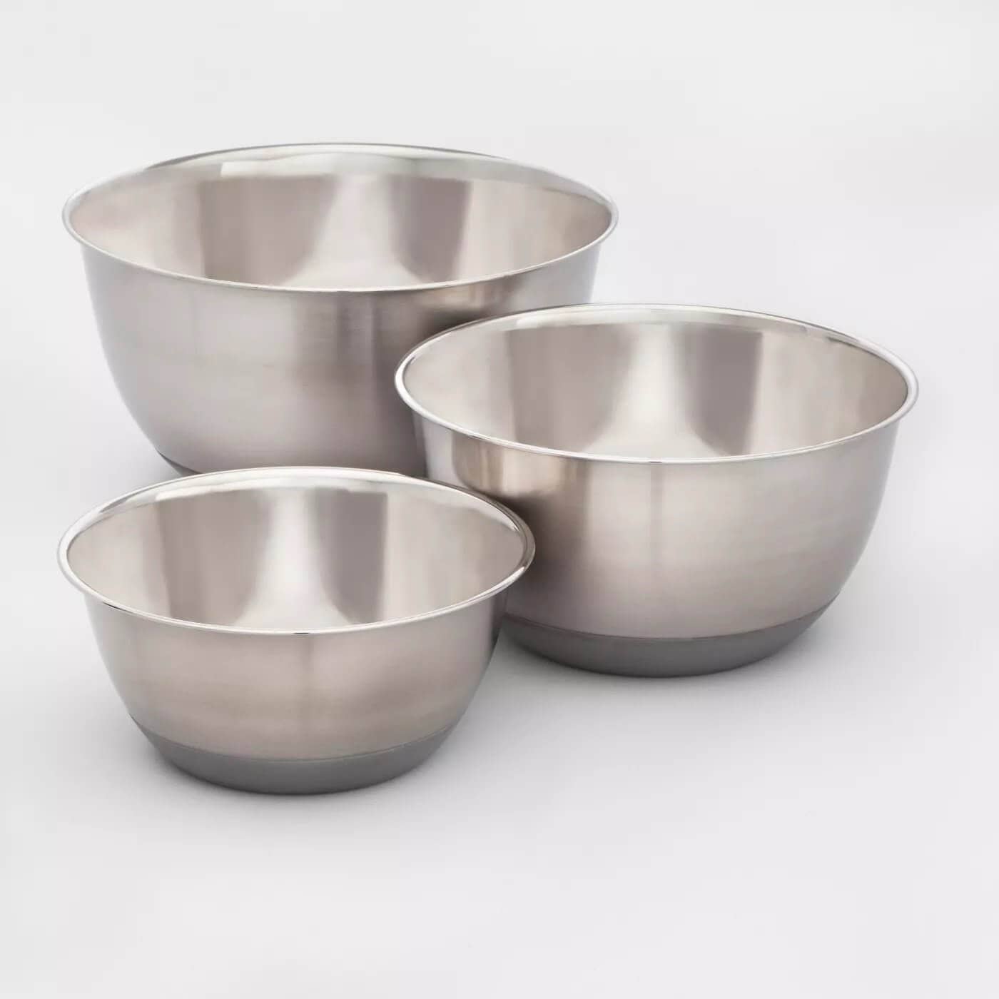 Set of three silver mixing bowls.