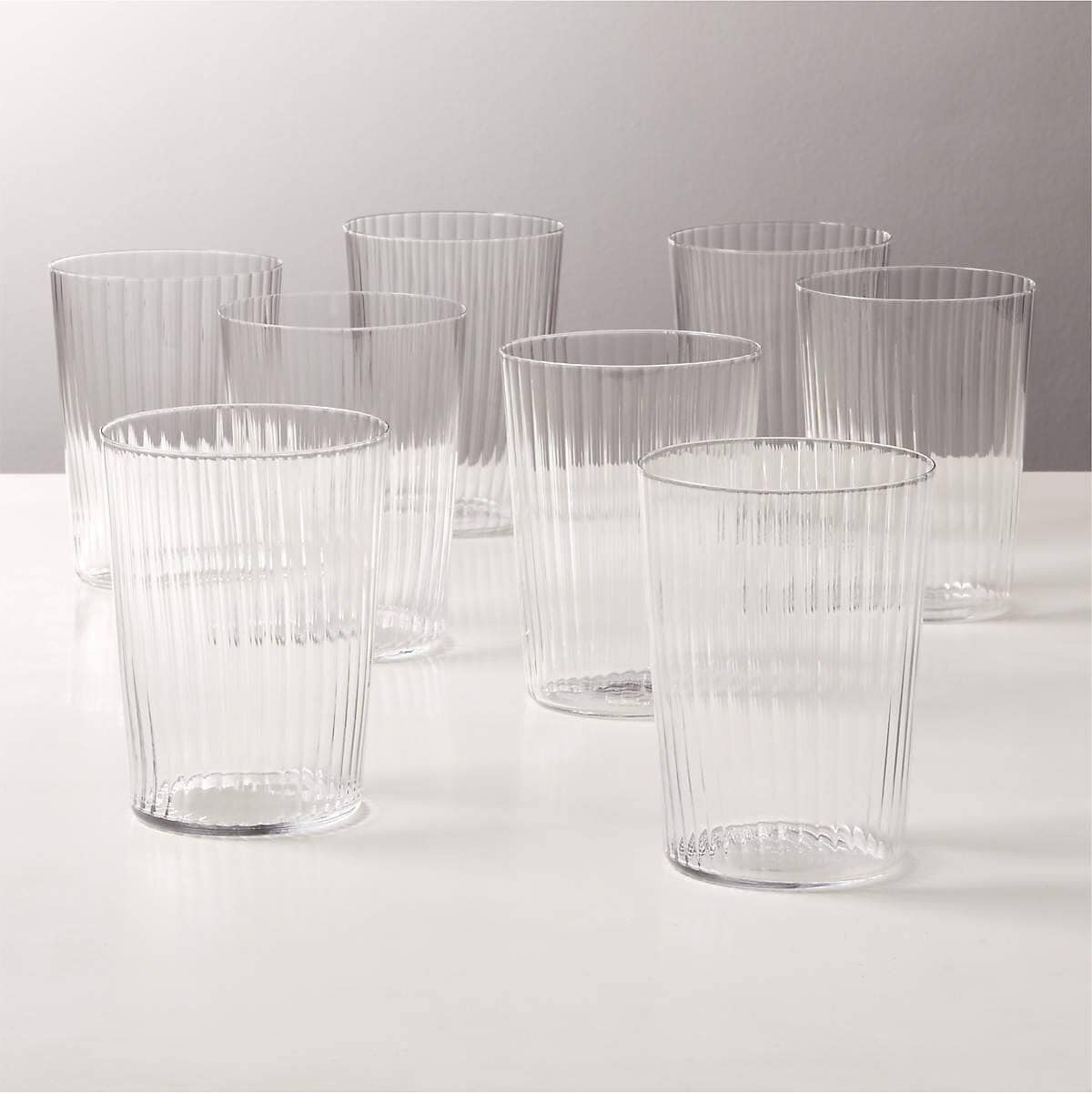 Eight ribbed glasses.