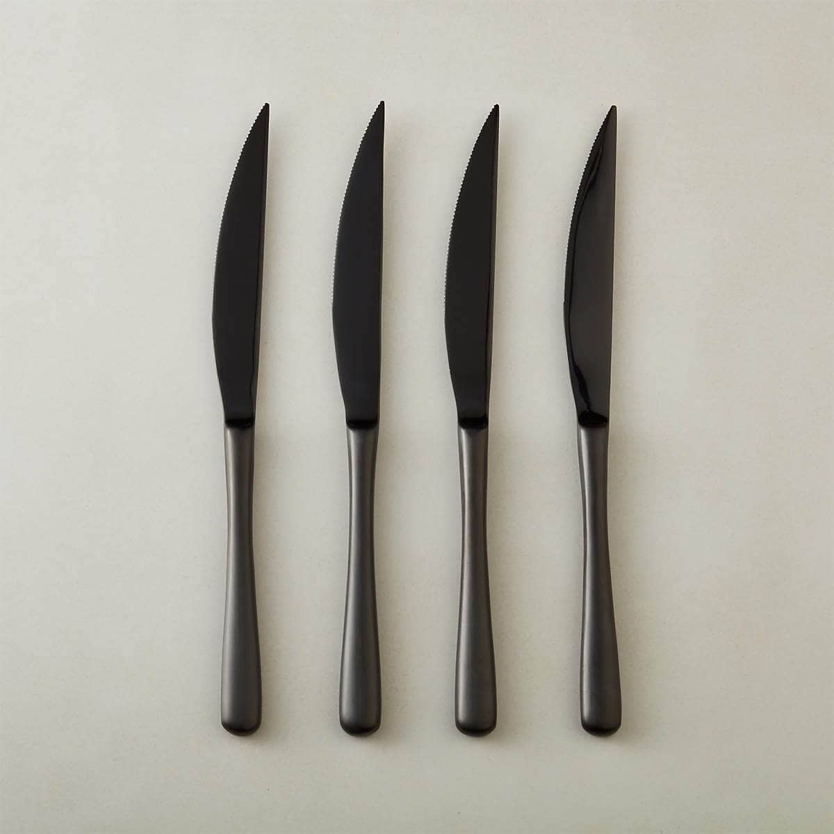 Four black knives.