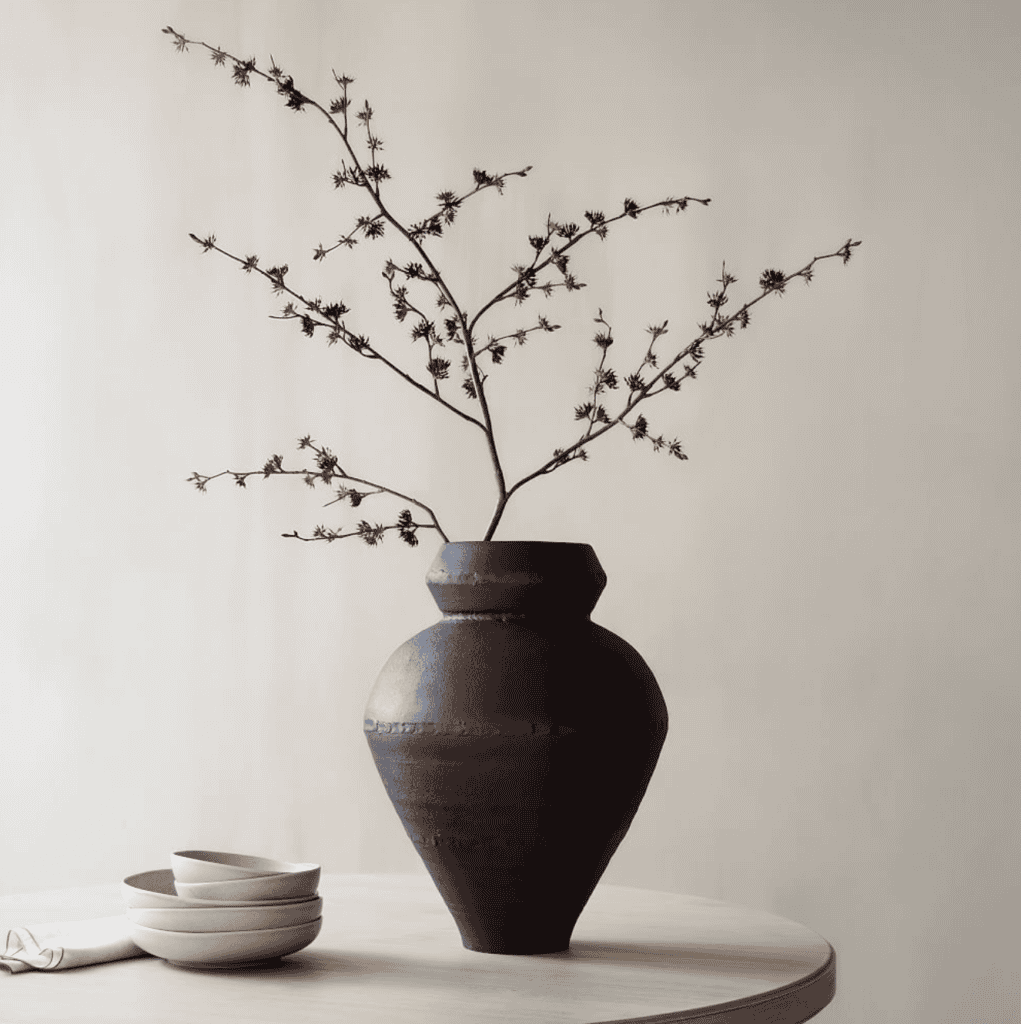 A vase sitting on a table