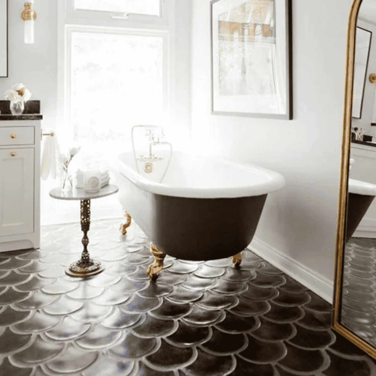 Black scallop tiles in a bathroom.