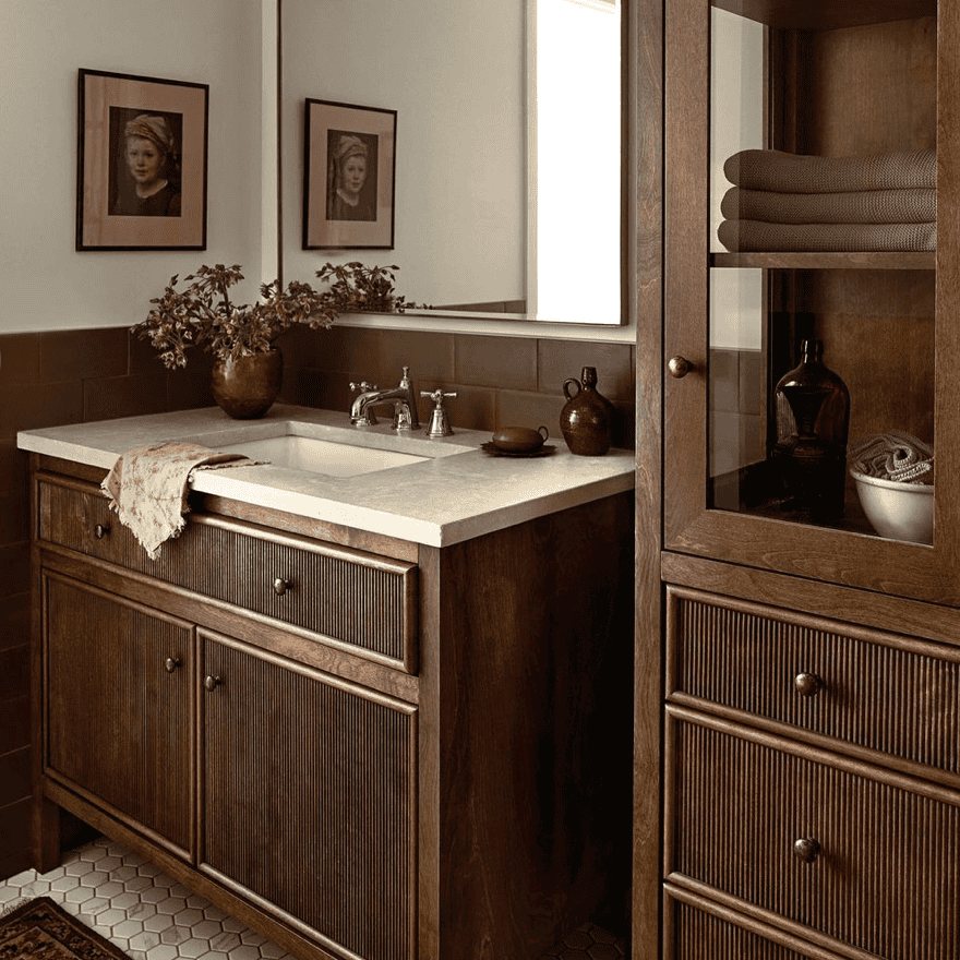 Wood cabinet next to a wood vanity.