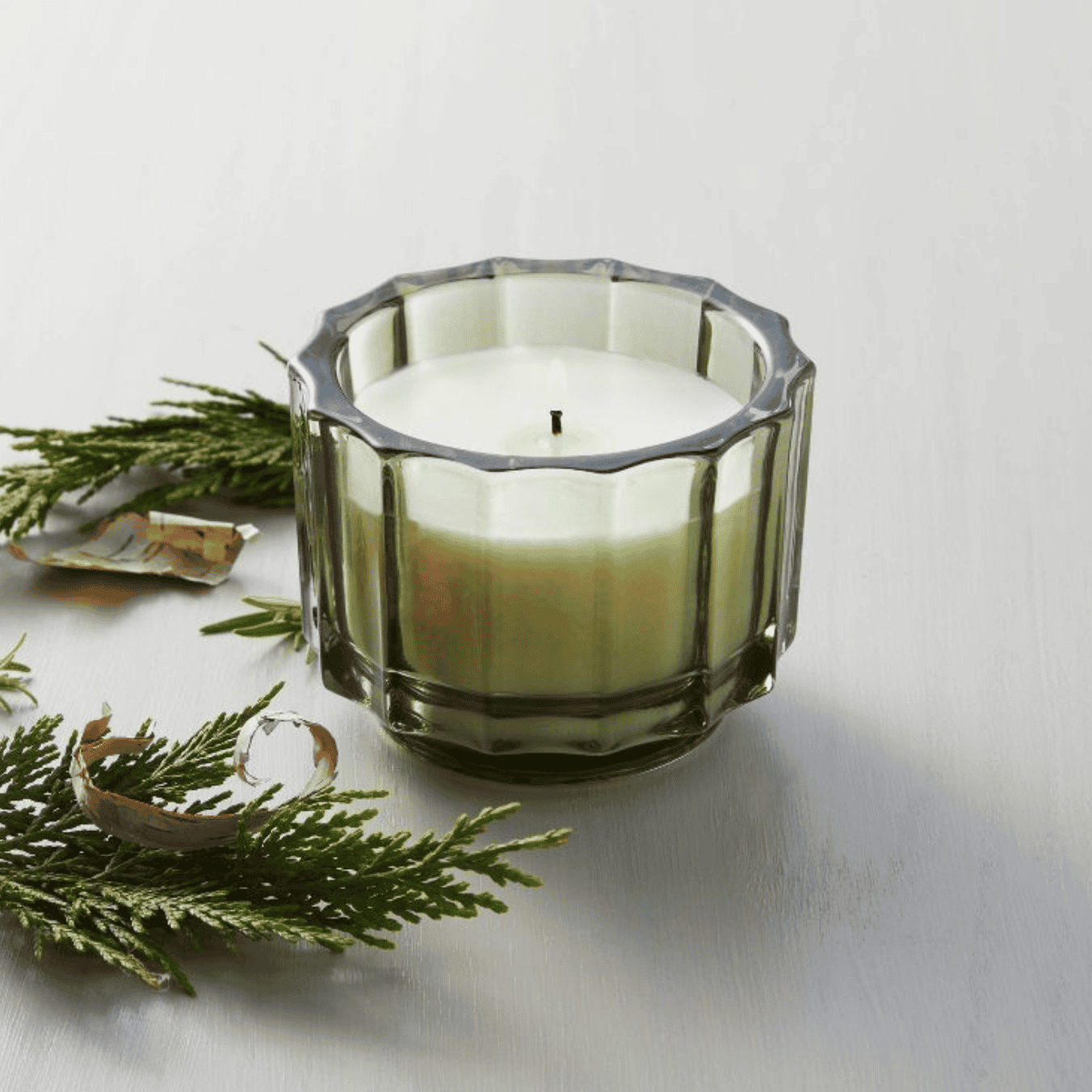 Candle in a glass holder.