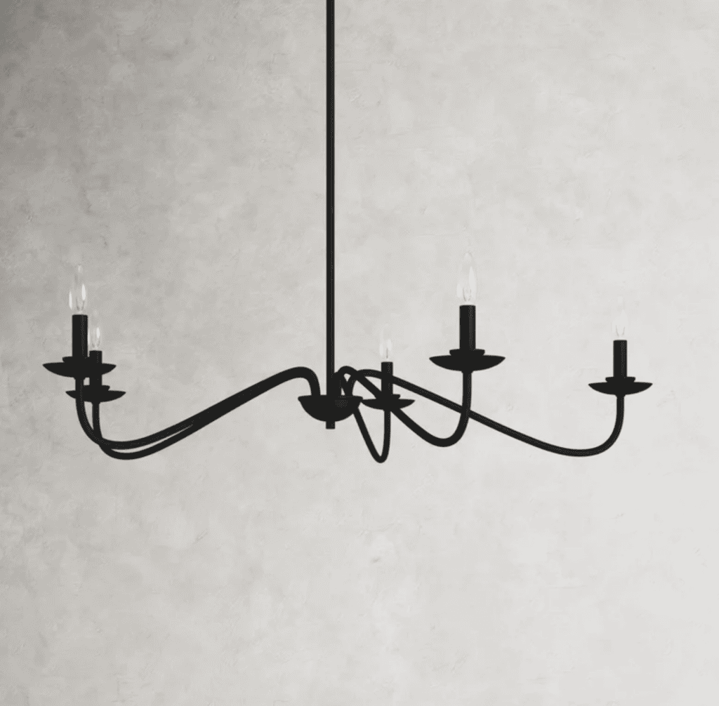 Black chandelier hanging in a marbled room.