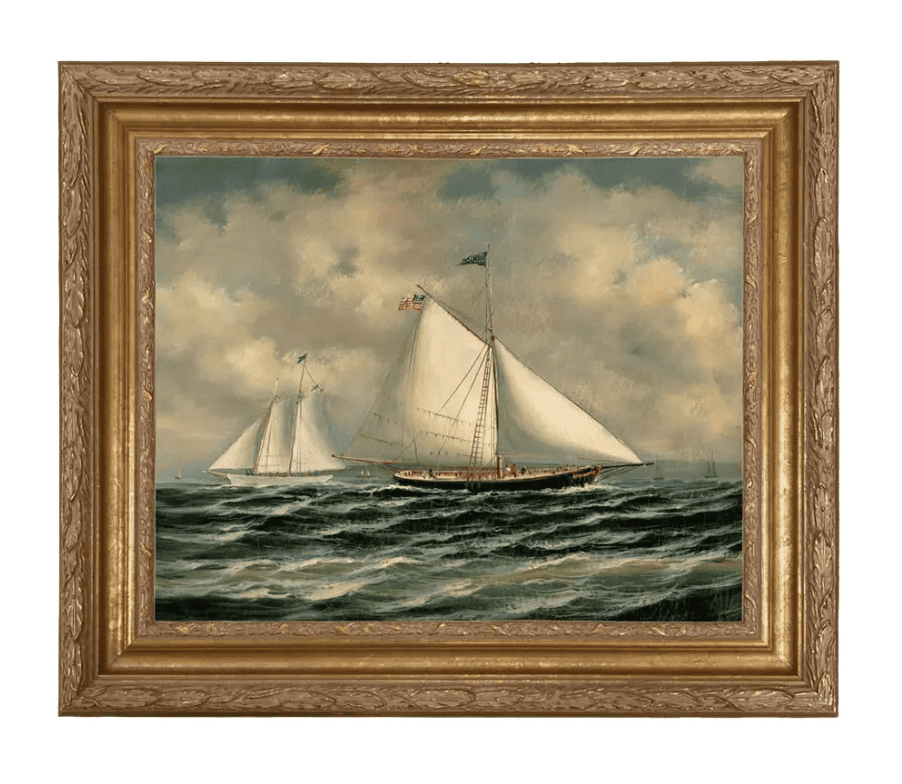 Framed picture of two sailboats.