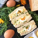 Three halved egg sandwiches.