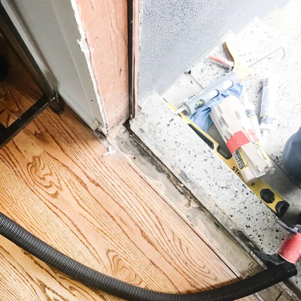 Door frame being removed.