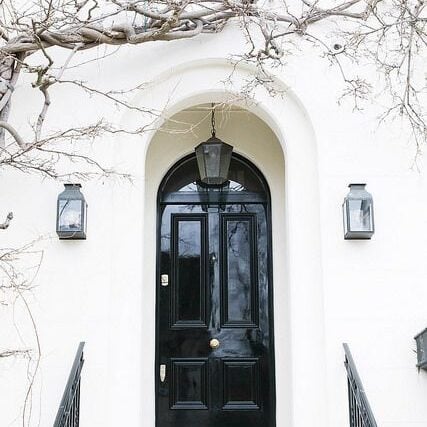 Black Glossy Door in a white house.