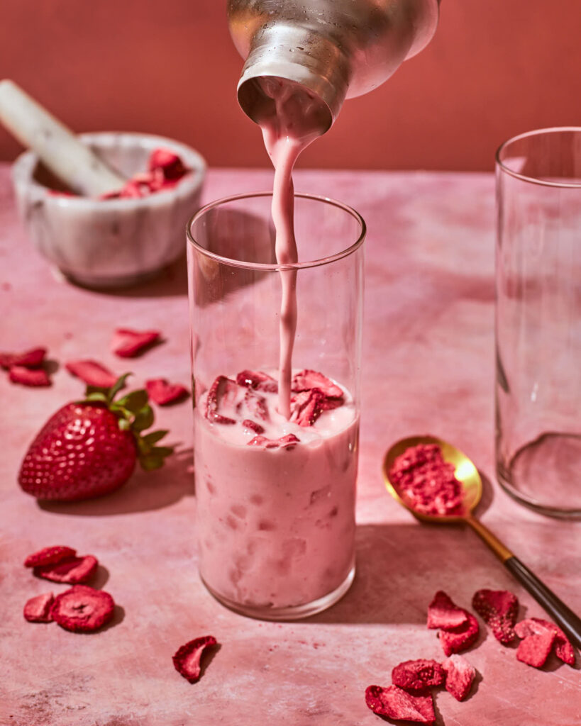 how to make strawberry acai with coconut milk pouring