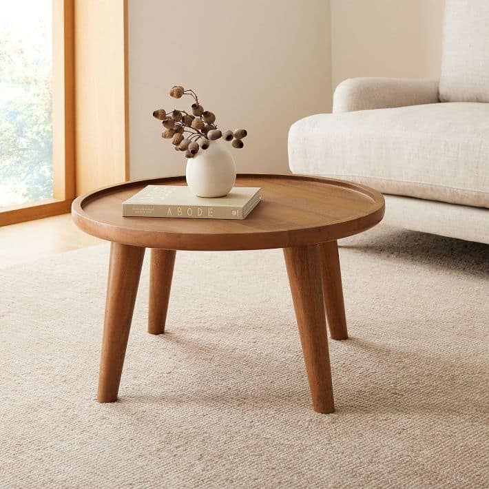 Round, mango wood coffee table.