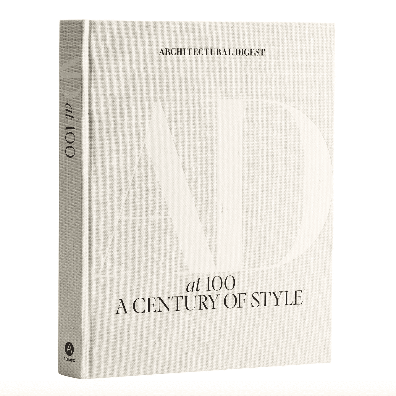 Large, white book labelled \"Architectural Digest at 100 A Century of Style.\"
