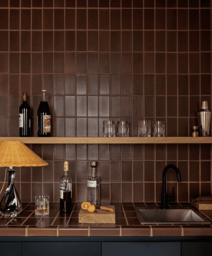 Tiled kitchen wall and counter.