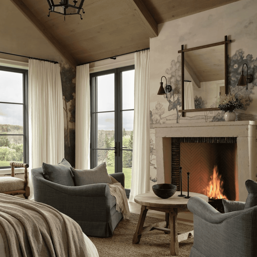 Cozy room with a lit fireplace and comfortable furniture.