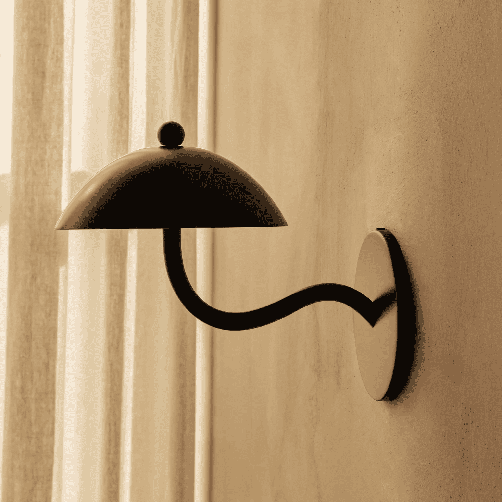 Black, rippled wall sconce.