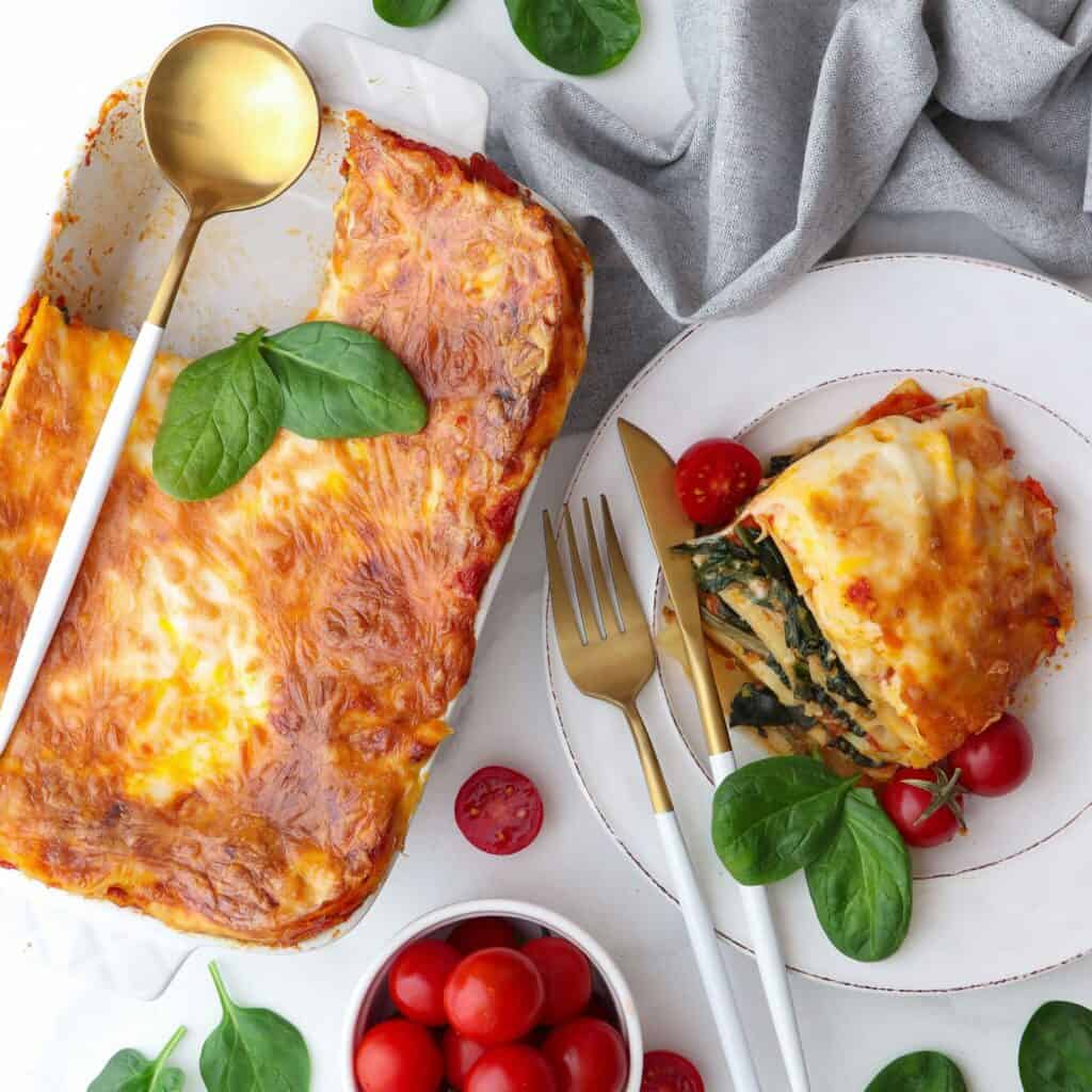 Slice of lasagna on a plate.