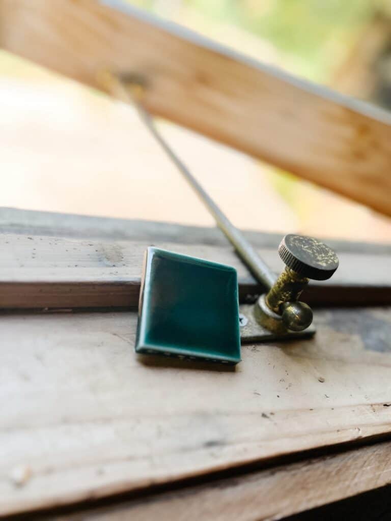 cabin tile and brass hardware 