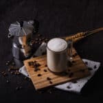 Flat white coffee table with maker