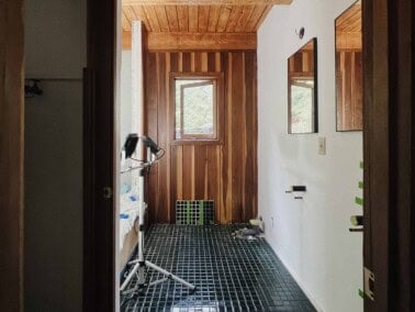 cabin bathroom with fireclay tile