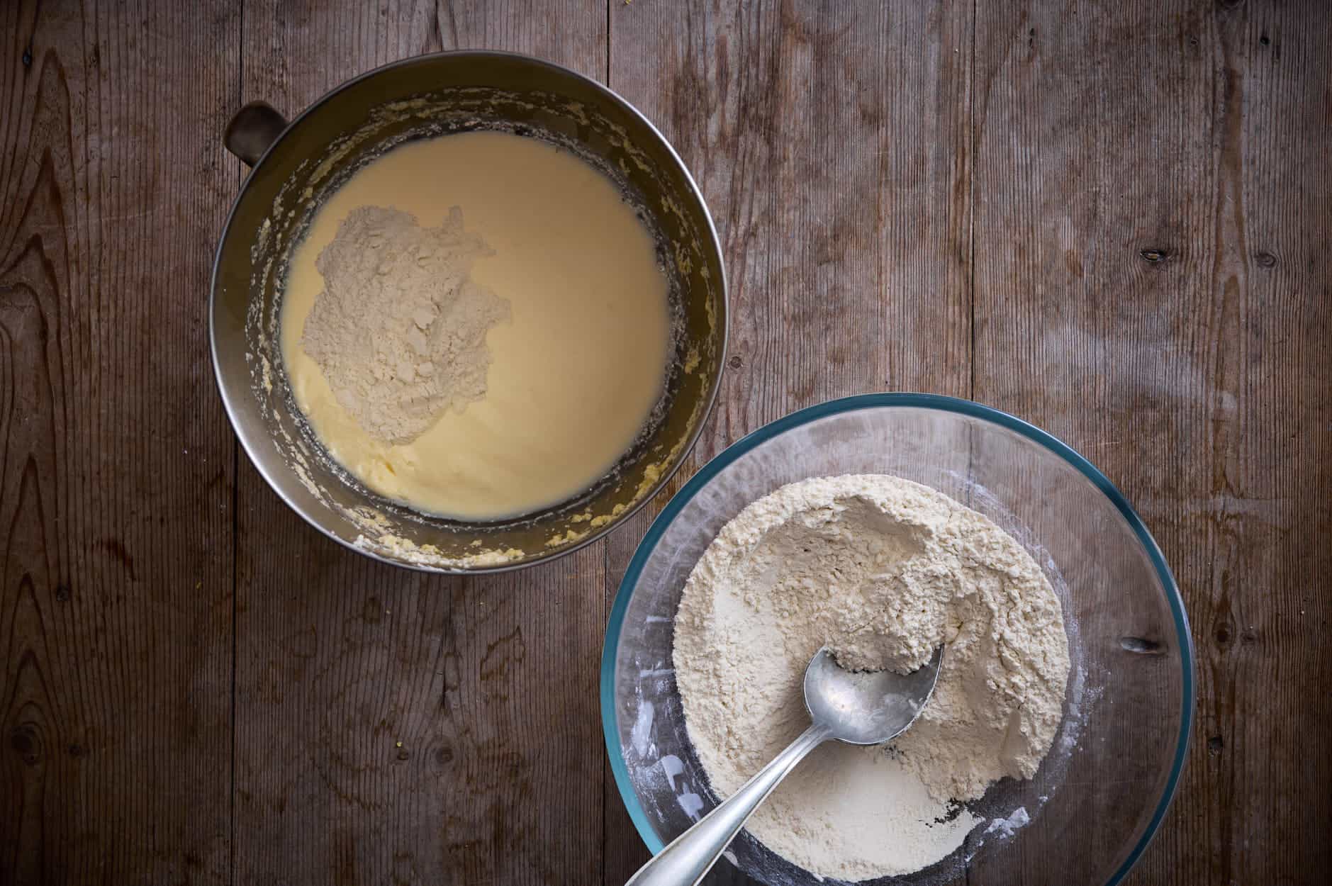 Dry ingredients in a bowl that include baking soda and powder, along with salt and flour for lemon curd cake.  