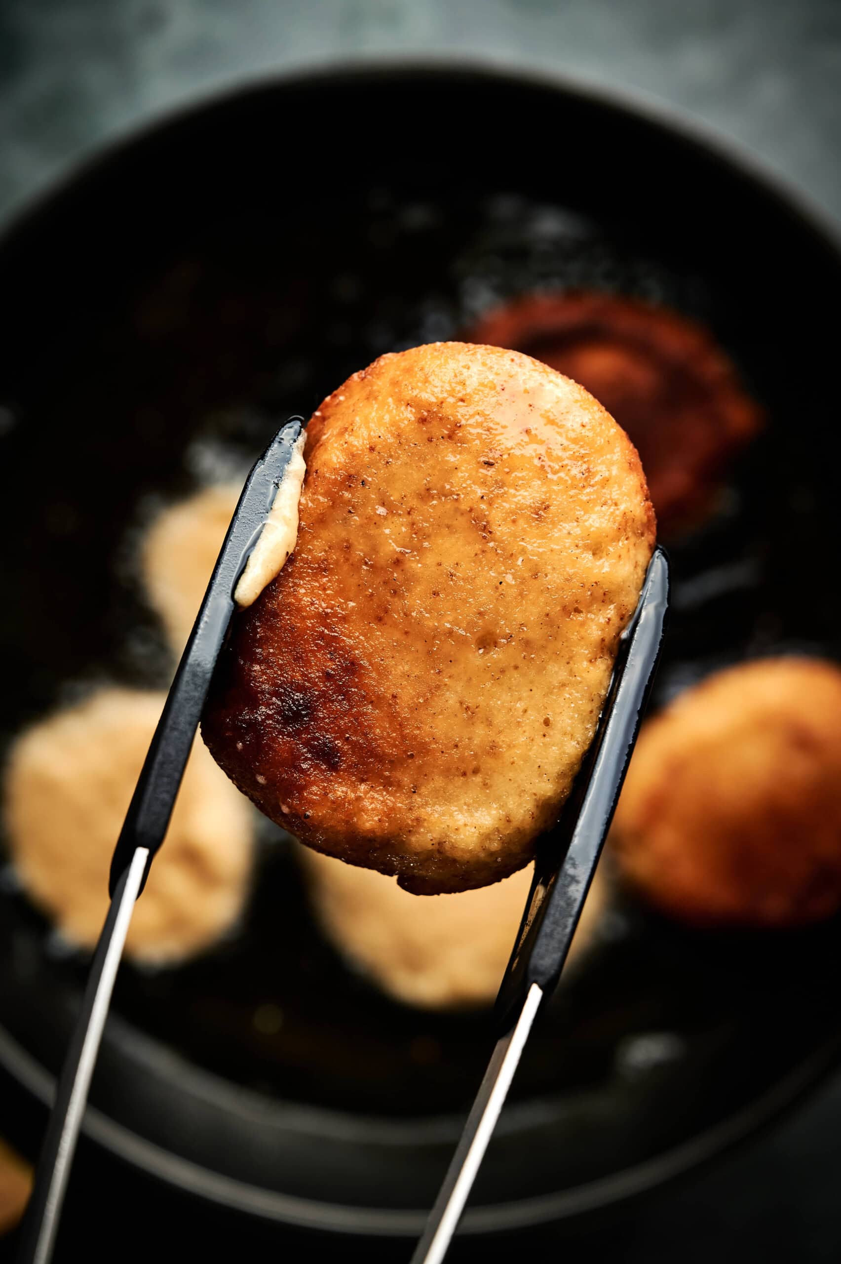 Frehly fried applesauce fritters up close.