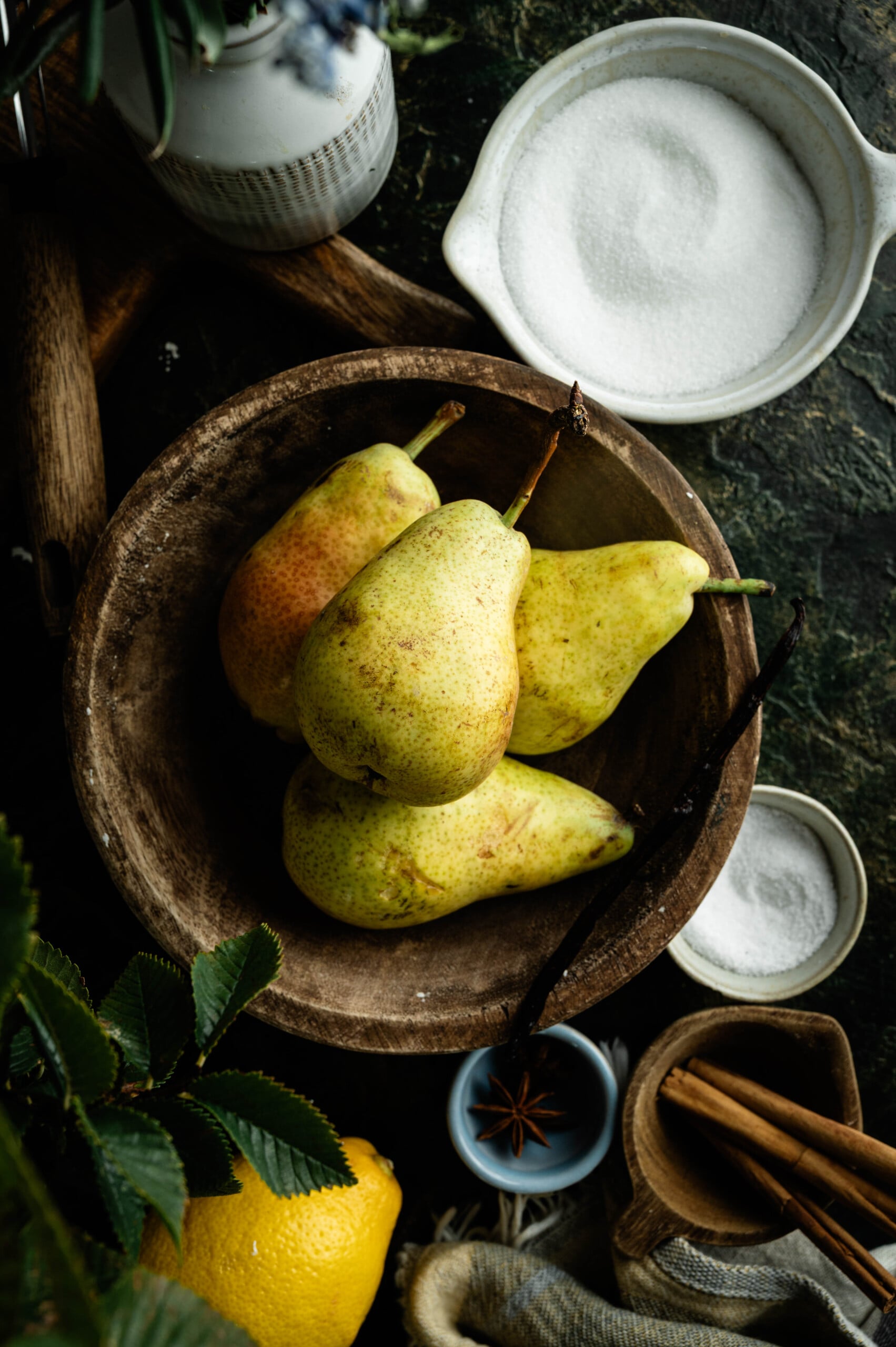Poaching liquid for pears made with sugar, citrus, vanilla, and warm spices.